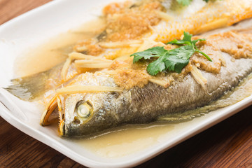 Oriental cuisine, traditional Chinese cuisine, steamed yellow croaker,