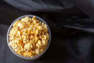 Popcorn in a large bucket.