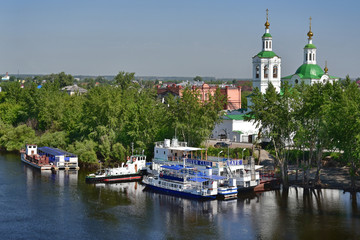 Fototapeta na wymiar Tyumen, a city on the Tura River and a beautiful promenade along the shore.