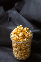 Popcorn in a large bucket.