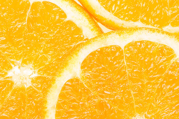 Macro close up photo of sliced orange  from above. Slice of juicy orange.