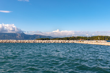 Fototapeta na wymiar Rocky pier in Ionian sea. Greece.
