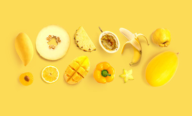 Creative layout made of  lemon, melon, passionfruit, pepper, banana, passion fruit, quince, mango,...