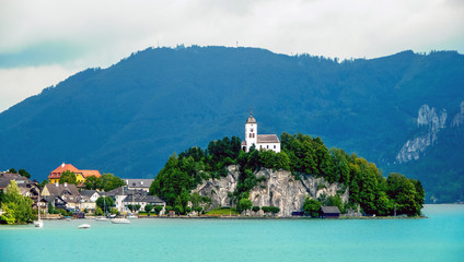 Traunkirchen, Upper Austria / Austria - August 2011: Skyline of the town and the church over the...