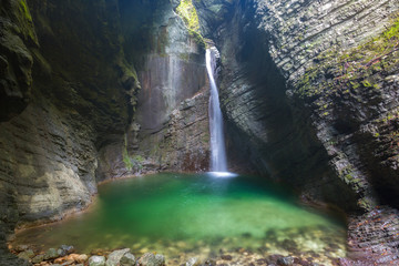 Fototapeta na wymiar Kozjak waterfalls to the beautiful cave of Triglav National Park, Slovenia