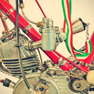 Retro styled image of the engine detail of a restored Italian motorcycle