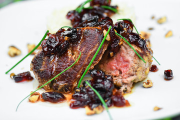 Beef steak with fruit sauce