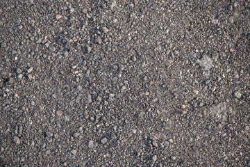 Background image of the surface of a gravel walking path