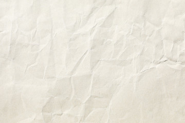 Old pale yellow crumpled paper background texture