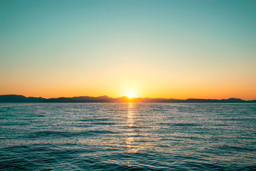 Obraz premium Sunset on Corfu Island in Ionian sea. Greece.