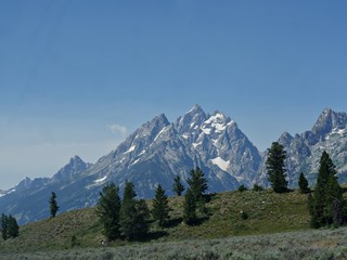 Obraz premium Distant peaks of the mountain ranges at the Grand Teton National Park.
