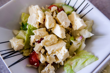 Lanashire Cheese and Tomato salad in a bowl