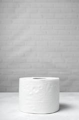 White rolls of toilet paper with white background