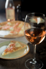 dinner table with meat pizza