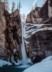 Fototapeta na wymiar the Pis del Passet waterfall in the upper Maira Valley