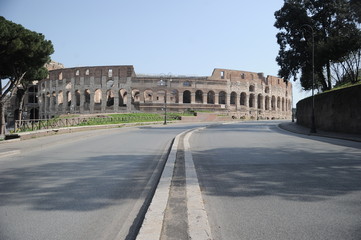 Rome, Italy-29 Mar 2020: Popular tourist spot Colosseum and Arch of Constantine is empty following...