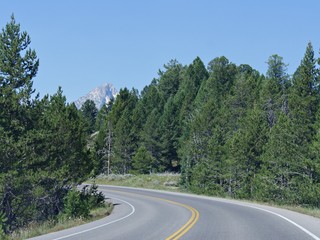 Scenic drive through winding roads at the Grand Teton National Park, Wyoming.
