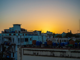 Fototapeta na wymiar View of rooftops of houses in sunrise in Havana, Cuba