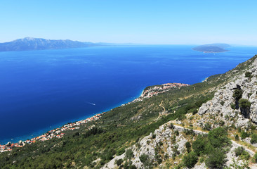 Obraz premium Memory for amazing trip in Split-Dalmatia mountains with this magical landscape with sea, Korčula peninsula and Hvar island. Clear Mediterranean sea after banned forbidden large ships