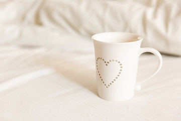 Fototapeta na wymiar Glass Cup Of Coffee. Closeup Coffee With Milk. Cappuccino. Coffee foam