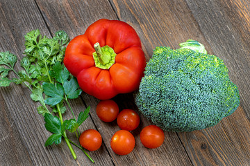 Fresh Vegetables and Herbs on Wooden Table
