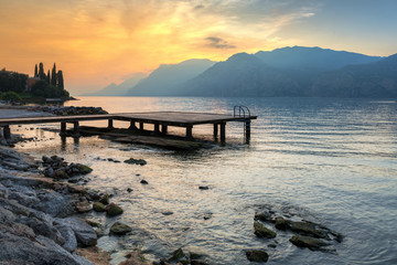 Beautiful coastline of Garda lake at sunset, northern Italy