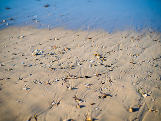 Pebble stones on a sandy beach in Cuba