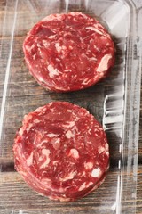Cutlets from fresh beef meat for the grill