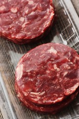 Cutlets from fresh beef meat for the grill