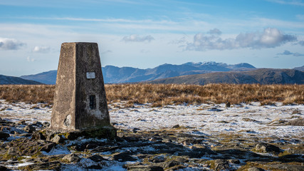 The summit trig point on High Street, a fell in the Lake District, Cumbria, England.