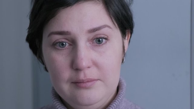 A woman is shocked and cries after she has a disease. Woman in shock crying. Girl feeling sad and depressed worried. 