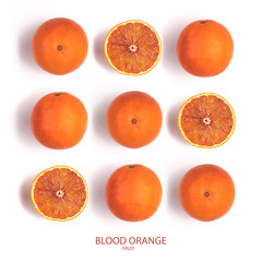 Pattern of cut blood oranges with different shades isolated on white background