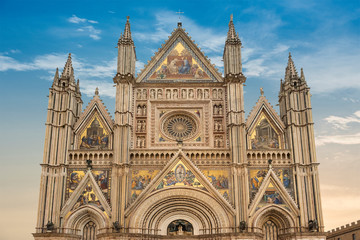Exterior view of Orvieto Cathedral in the cathedral square, a 14th-century Gothic cathedral in...