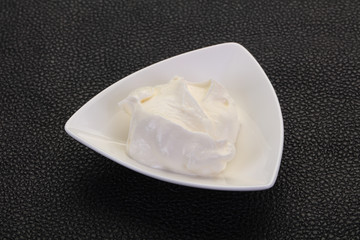 Sour cream in the bowl