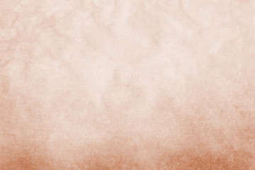 Handmade peachy texture. Crafted grunge background.