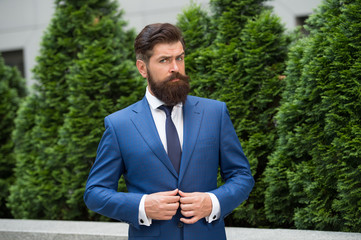 Business life. Man businessman classic style urban park background. Business man bearded wear...