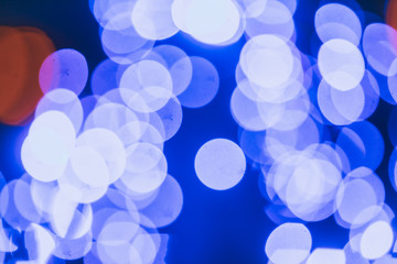 Bokeh, abstract night lights, defocus. Blurred Abstract Night Background