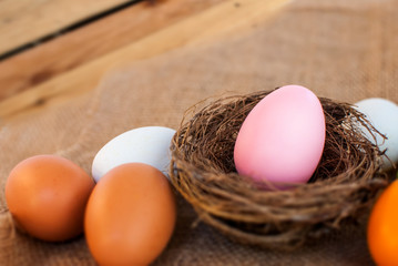 Easter eggs in a basket, the beauty of color and religion