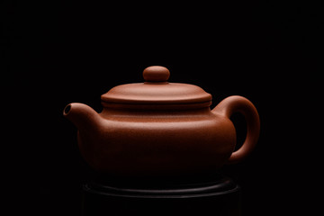 Chinese teapot on a black background