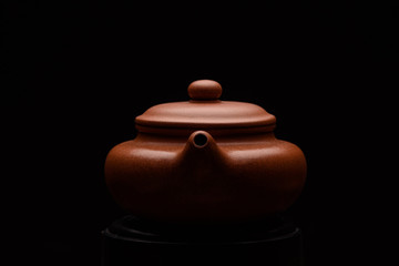 Chinese teapot on a black background