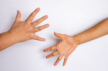 The fingers of two women showing their meaning on a white background