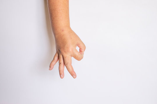 The finger of a woman showing the meaning on a white background