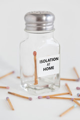 Matchstick in glass bottle with wording " ISOLATION AT HOME "..Social Distancing/Quarantine / Self-Isolation concept. New corona virus (novel Coronavirus 2019 disease,COVID-19,nCoV) background.