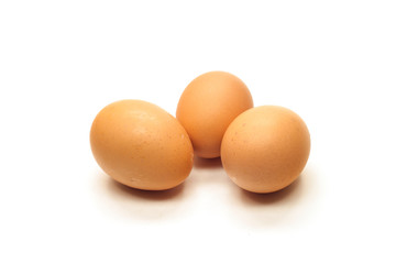 three eggs isolated on white background