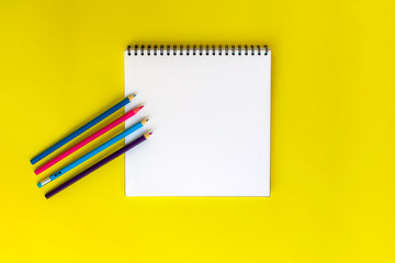 Notepad on a yellow background.