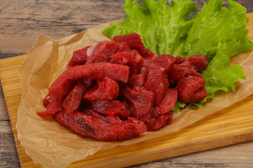 Raw beef meat sliced for cooking