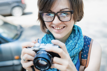 portrait of a beautiful girl with the camera