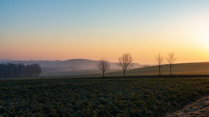 Fototapeta na wymiar Sonnenaufgang über der Region Greiz bei Hohndorf