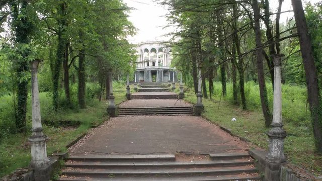 The ruins of the old Soviet sanatorium, whose architecture which is basically a synthesis of Stalinist period classical style and of Georgian ethnic decor with Gothic and Roman features.