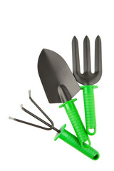 Gardening tools isolated on white wooden background, top view